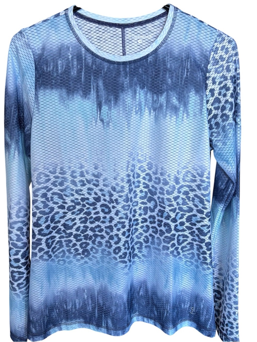 Women's long sleeve Sofibella sports top. Can order matching skort and tops.